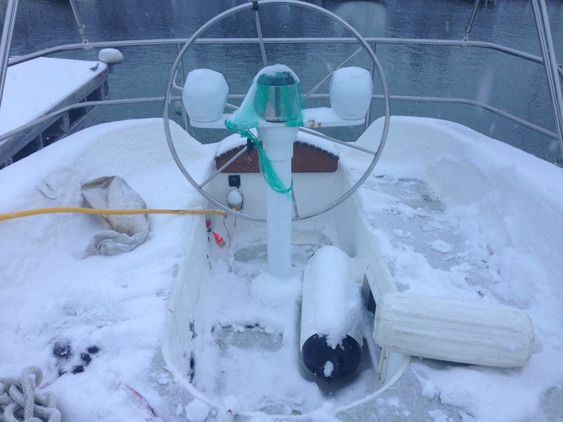 The cockpit of our old boat, Owl, on launch day. It was so cold but now we laugh about it.