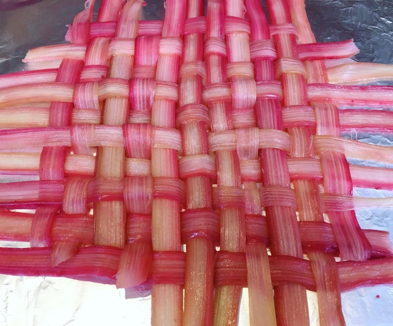 Woven rhubarb prepped on foil.  